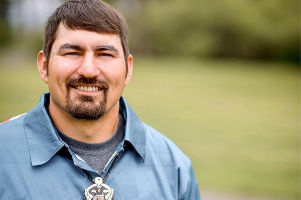 Headshot of Tyrel Fenner, Hydrologist for Blackfeet Nation