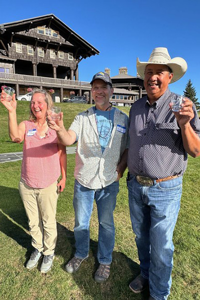 Jen Ferenstein, Kendall Flint, and Terry Tatsey toast the retirement with glasses that say “No Solenex.”