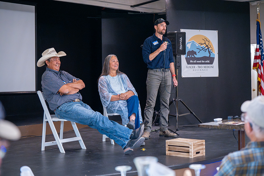 Guest speakers being introduced on stage at the 2023 Fall Gathering event