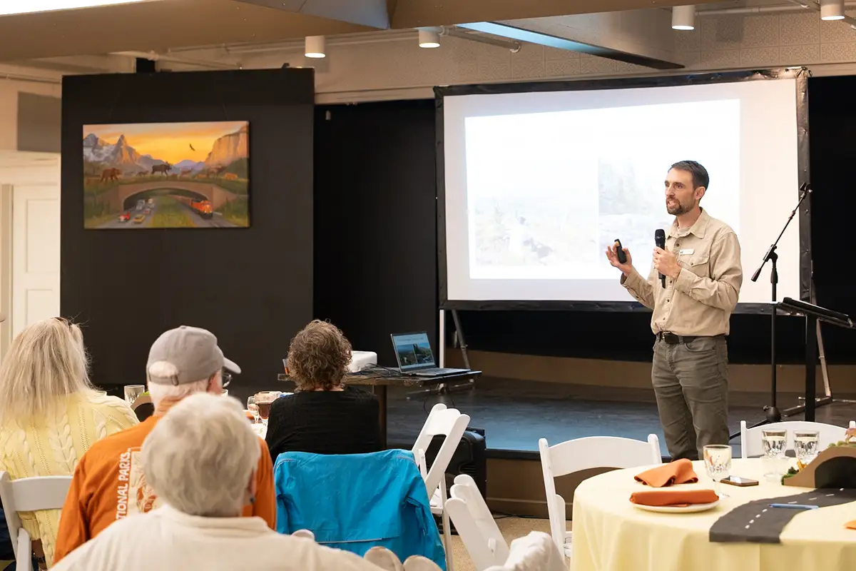 GTMA Executive Director Peter Metcalf unveiling Safe Passage, a new painting by renowned Montana artist Monte Dolack.