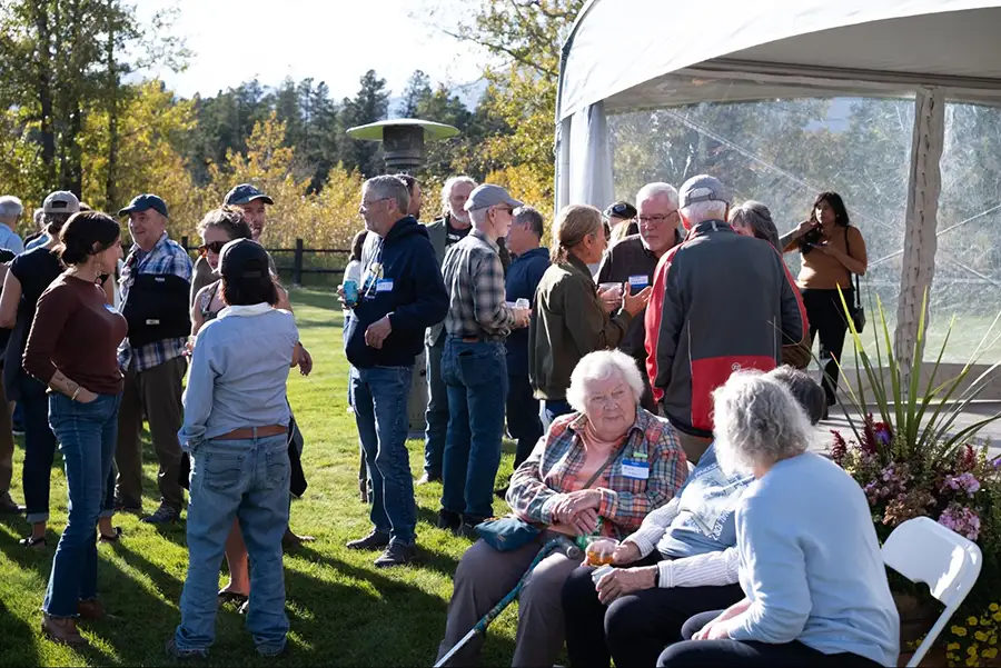 2026 Fall Gathering attendees mingling during happy hour