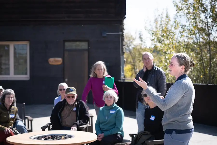 2026 Fall Gathering attendees participate in a facilitated conversation outside