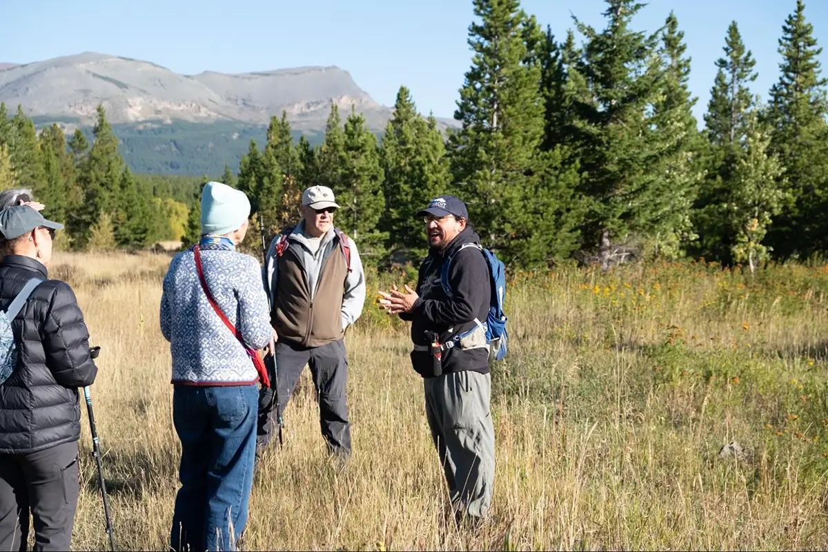 2026 Fall Gathering participants join a led hike on a sunny autumn day